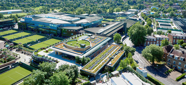 A stunning aerial view of Wimbledon, showcasing the iconic All England Lawn Tennis and Croquet Club