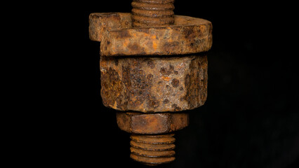 rusty nut. Rusty iron rod with screw threads. Rusted mechanical components. threaded bolt and nut isolated close up. dismantling concept, difficult to unscrew, non-removable.