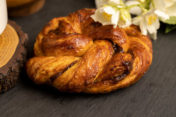 braided fresh bun for tea on the table