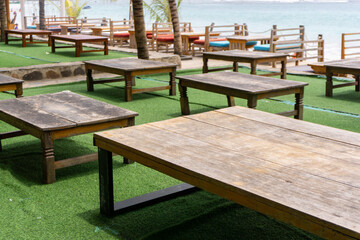 Empty tables at the beachside cafe in Aceh Besar, Indonesia
