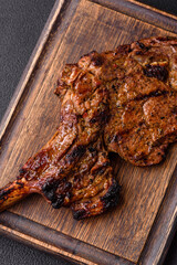 Juicy beef tomahawk steak on the bone baked on the grill