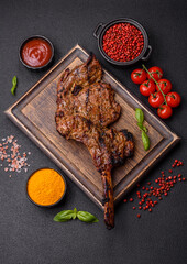 Juicy beef tomahawk steak on the bone baked on the grill