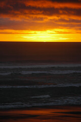 Naklejka premium Sun setting in the southern regions in the world across New Zealand