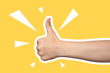 Child's hand shows thumbs up, class, like. Gesture isolated on yellow background. Modern design,...