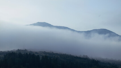 Morning valley with foggy view from above