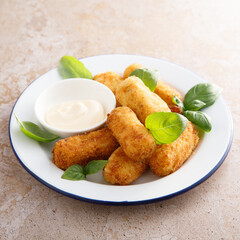 Traditional homemade croquettes with sauce