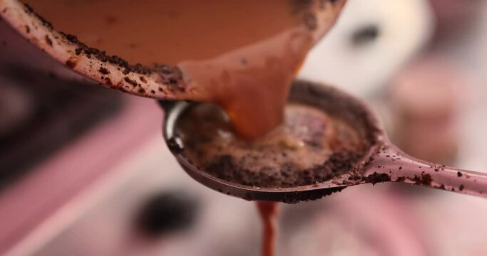 Masala chai tea. Preparation of butter tea. Milk is poured into a pot with tea.