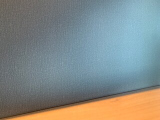 Wooden table and blue background with gradient lighting shiny at right