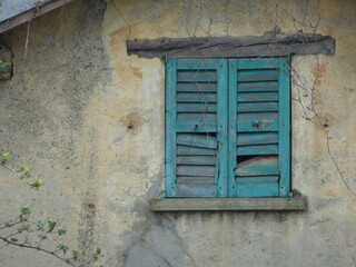 An old window in the wall, Bellagio, Italy.