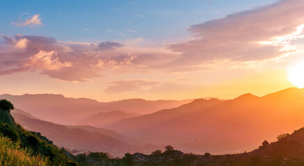 beautiful scenic sunset landscape of a canyon between two mountains
