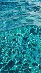clear water background showing the blue and green colors below the surface
