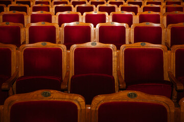 Row of red seats in theatre