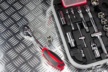 Tools Set on Checkered Metal Surface