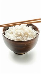 A bowl of steamed white rice with a pair of chopsticks, isolated on a solid white background