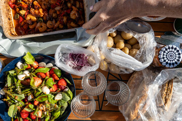 Stockholm, Sweden A picnic on a small motorboat consisting of boiled potatoes,