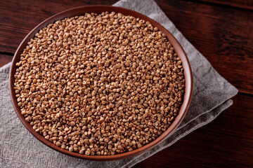 Organic Buckwheat Groats on Plate, Gluten-Free Superfood for Healthy Eating, Close Up