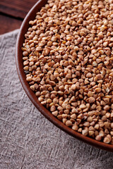 Organic Buckwheat Groats on Plate, Gluten-Free Superfood for Healthy Eating, Close Up