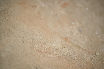 Aged brown textured paper with grunge pattern and stone-like surface