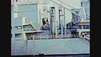 Genova, Italy - circa 1981: British cargo ship. Navigating in the port of Genova city in 1981. Archival of Italy in the 1980s with Genova Italian harbor.