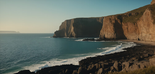  A serene coastal inlet with cliffs rising dramatically from the sea.