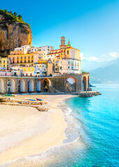Morning view of Amalfi cityscape on coast line of mediterranean sea, Italy