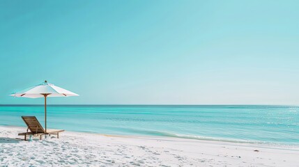 beach with umbrella and chairs