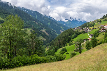View of the mountains, valleys and the village of Brandberg near Mayrhofen in Austria