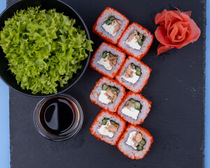 Philadelphia roll sushi with salmon, prawn, avocado, cream cheese. Sushi menu. Japanese food.