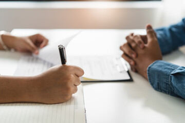Young man interviewing with interviewer for university applicant