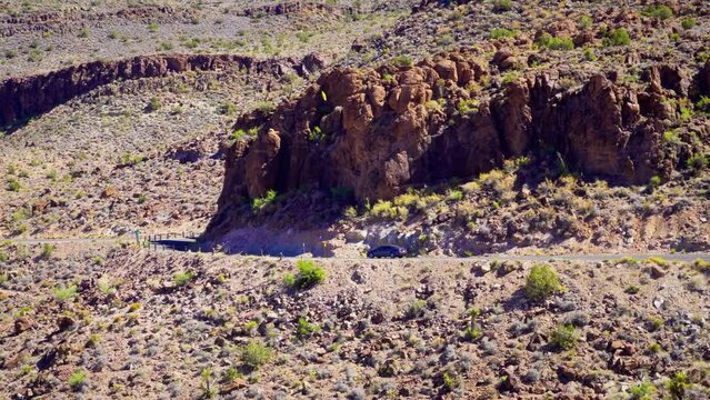 Car driving on historic Route 66 in the Black Mountains near Oatman, Mohave County, Arizona. 4K UHD video.