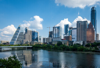 Fototapeta premium Modern apartment buildings and offices by the Colorado River in cityscape skyline of Austin Texas