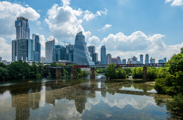 Austin, TX - 15 June 2023: Modern apartment buildings and offices by the Colorado River in...