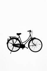 Fototapeta premium Minimalist Black and White Silhouette of a Bicycle on a White Background, Perfect for Modern Design Concepts, Transportation Themes, and Artistic Projects