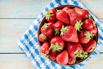 Vibrant Red Strawberries on Rustic Wooden Table, Nutritious, Seasonal and Homegrown Produce, Copy Space