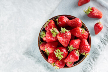 Fresh Ripe Strawberries in Bowl on Gray Napkin, Copy Space