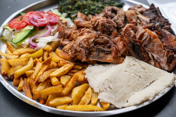 Plate with meat and fries
