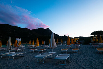 Pink sunset on Perd'e Pera beach on Sardinia island,Italy in May, Tyrrhenian Sea. Golden hour.