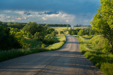 Quiet country road through the prairie landscape