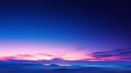 Fototapeta premium Vibrant Twilight Sky Over Silhouetted Mountains
