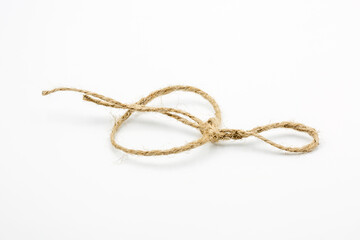 Thick felt rope tied in a noose closeup on a white.