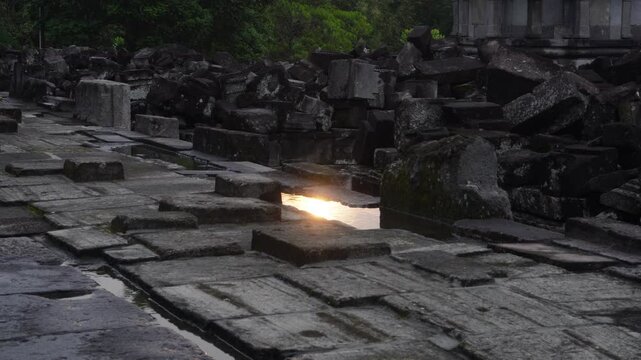 Reflection effect by the water of sunset on the Prambanan compound
