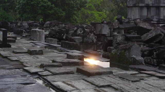 Reflection effect by the water of sunset on the Prambanan compound