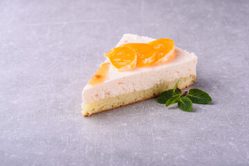 Slice of cake on a gray background for a restaurant