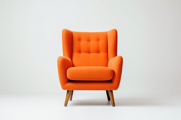 orange leather armchair with yellow pillows