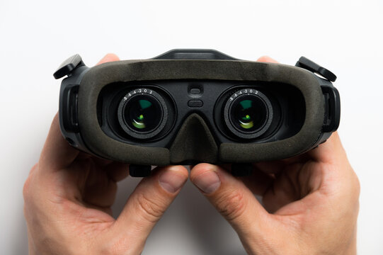 Black fpv or virtual reality glasses with lenses, on a white background. Close-up view from inside