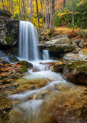 Autumn foliage and cascading water in the Blue Ridge Mountains of North Caolina