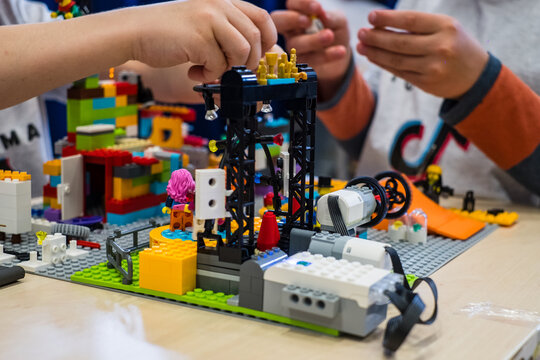 Tallinn, Estonia - May 5, 2024: Moving Lego robot built by kids. At First Lego League children build robots and solve robotics challenges.