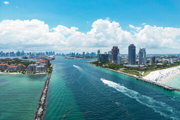 Skyline of Miami Beach from top. Summer in Miami. Miami beach coastline. Panoramic view of Luxury condos in Miami Beach Florida. Aerial View of Surfside Miami Beach.