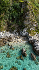 Aerial view of Michelino beach in Parghelia, Tropea. Calabria. Italy. Transparent sea and luxuriant nature. The most beautiful beach in Europe
