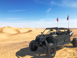 Landscape of sand dunes in national park with amazing california desert with ATV vehicle 